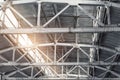 Old abandoned decay industry factory or plant roof ceiling interior with concrete and steel metal construction frame Royalty Free Stock Photo