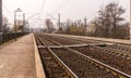 Old deserted railway peron. Abandoned station in harming quarantine and lockdown Royalty Free Stock Photo