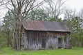 A primitive house cabin with stone rock fireplace