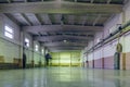 Old abandoned empty production hall, factory interior Royalty Free Stock Photo