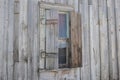 Shuttered window on an abandoned farm house on high Desert of Central Oregon Royalty Free Stock Photo