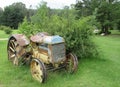 An old abandoned farming tractor on farm Royalty Free Stock Photo