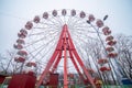 Old abandoned ferris wheel. Attractions closed for the winter