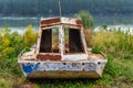 Old abandoned fishing boat on the shore Royalty Free Stock Photo