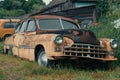 Old abandoned and forgotten rusty vintage retro car in bad condition