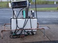 Old abandoned gas pump at a derelict service station