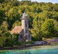 Old Abandoned Grand Island Lighthouse Stands tall on Lake Superior shore Royalty Free Stock Photo