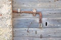 Old, abandoned, gray, wooden door with padlock Royalty Free Stock Photo