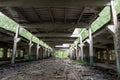 Old abandoned hangar. Large abandoned building. Old Soviet hangar. Royalty Free Stock Photo