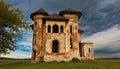 Old abandoned haunted house and sky in Transylvania with clouds Royalty Free Stock Photo