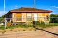 Old Abandoned Home With Boarded Up Windows On Blocks Royalty Free Stock Photo