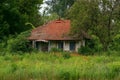 Old abandoned house in the countryside with broken roof and windows Royalty Free Stock Photo