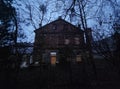 Old abandoned house in evening at dusk. Old abandoned kamenica in Poland