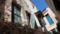 An old abandoned house with green windows Royalty Free Stock Photo