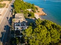 old abandoned house with pool on the beach overgrown with palm trees and plants, lost places, tarragona spain Royalty Free Stock Photo