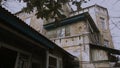 Old abandoned house, view from the street. Traces of fire and vandalism