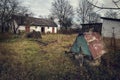 Old abandoned house in the village. Rustic destroyed home in the countryside farm.