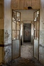 Old abandoned industrial building with broken glass, Pordenone, Italy