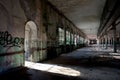 Old abandoned industrial building with broken glass, Pordenone, Italy