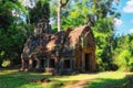 An old abandoned Khmer building in a Cambodian forest, a monument of medieval Asian architecture, a house Royalty Free Stock Photo
