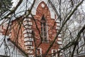 Old abandoned manor house in autumn forest.