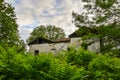 Old abandoned manor house with boarded up windows Royalty Free Stock Photo