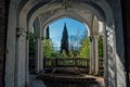 Old abandoned mansion. Balcony with columns and beautiful view to the park and black sea Royalty Free Stock Photo