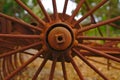 old abandoned metal wheel of farm machinery from 19th century Royalty Free Stock Photo
