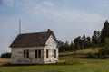 An old abandoned one room school house on the prairie of North Dakota Royalty Free Stock Photo