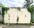 Old and abandoned outdoor space with thin iron wall Royalty Free Stock Photo