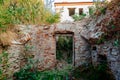 Old abandoned overgrown houses in ghost town Royalty Free Stock Photo