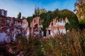 Old abandoned overgrown houses in ghost town Royalty Free Stock Photo