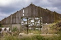 Old abandoned overgrown and ransacked farm in the Netherlands