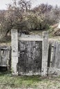 Old abandoned palisade garden door in Sic. Transylvania, Romania