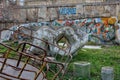 Old abandoned playground with graffiti and rusted roundabout in central Baku, the capital of Azerbaijan