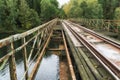Old abandoned railroad bridge above river in Poland Royalty Free Stock Photo