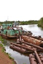 The old abandoned river port on the river cargo rusty ships. An old sand barge. Royalty Free Stock Photo