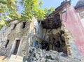 Old abandoned roof collapsed farm house building in italy