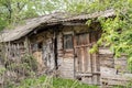 Old abandoned rotting house in the village