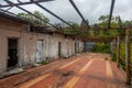 Old abandoned ruined building. Cloudy sky.