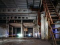 Old abandoned and ruined industrial building interior Royalty Free Stock Photo