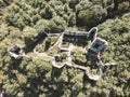 Abandoned ruins of old stone castle overgrown in forest on Tepec hill, overlooking small tourist town of Samobor, Croatia Royalty Free Stock Photo