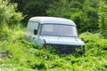 Old, abandoned, rusted and broken van