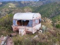 Old abandoned rusted roulotte Rv van