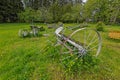 Old abandoned rusty agricultural machines and tools Royalty Free Stock Photo