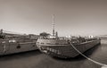 Old abandoned rusty barges in the sea