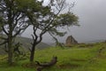 An old Abandoned Scottish Cottage ruin high up a Valley on the Old Military Road to Banchory on a wet day.