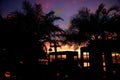 Old abandoned screaming haunt houses by the sea and ghosts and spirits and sunset sky