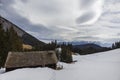 Old abandoned shepherd house in a frosty winter wonderland, Carpathians