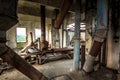 Old abandoned silo elevator with rusty equipment left Royalty Free Stock Photo